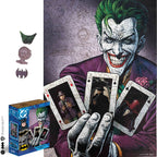 Jigsaw puzzle of The Joker holding playing cards with a box and pieces displayed.