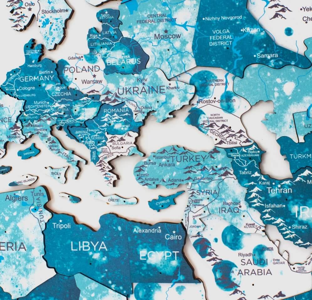 colorful map of world on wood