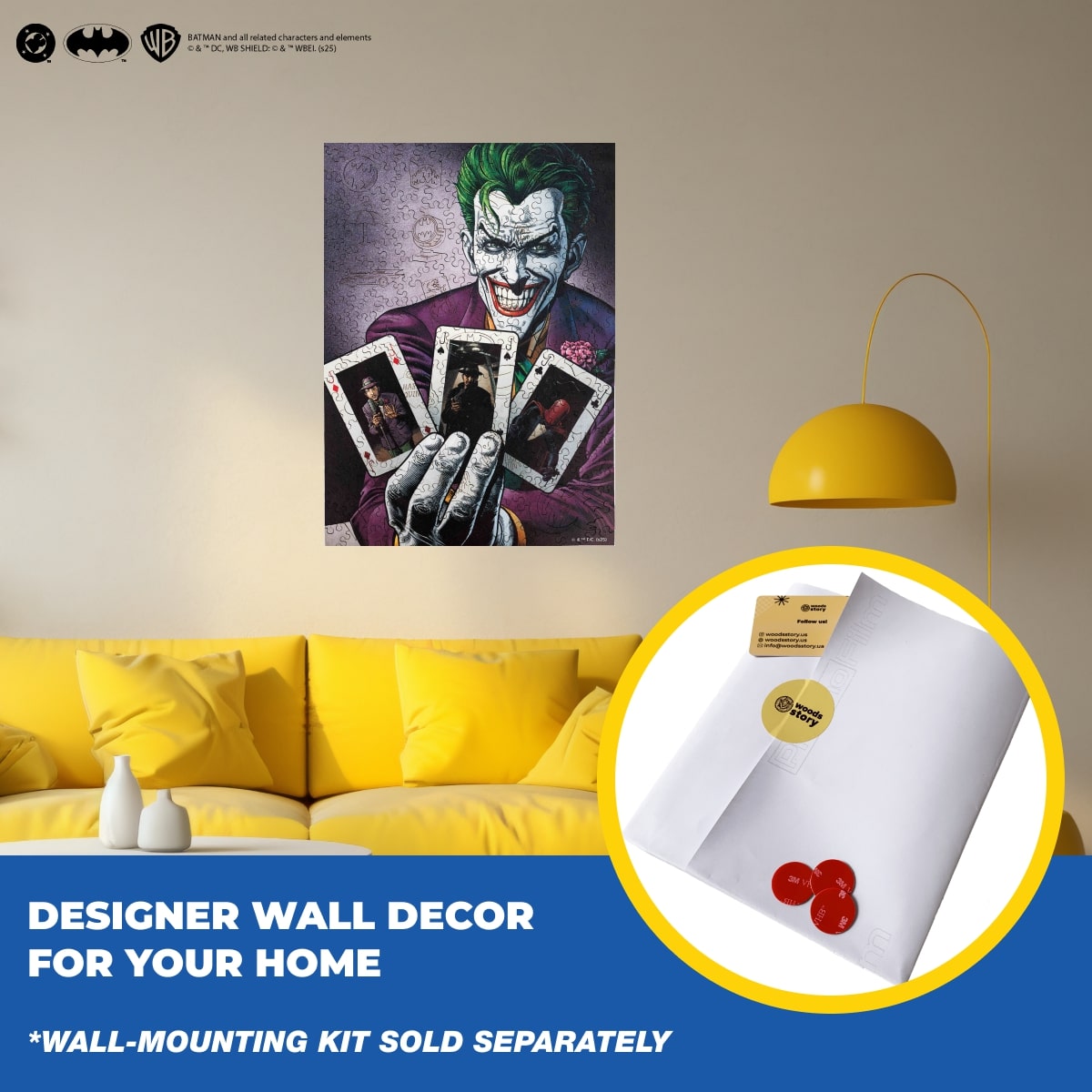 Wall art of a character holding playing cards in a living room with yellow sofa and lamp.