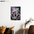 Poster of a character holding playing cards in a living room setting with a plant and table.