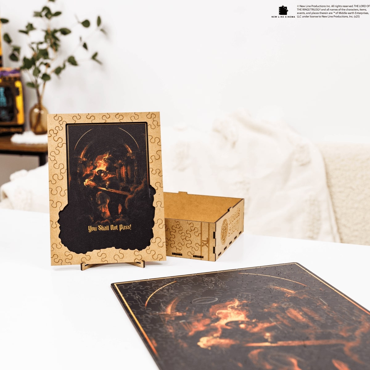 Decorative puzzle box with a lion design on a table