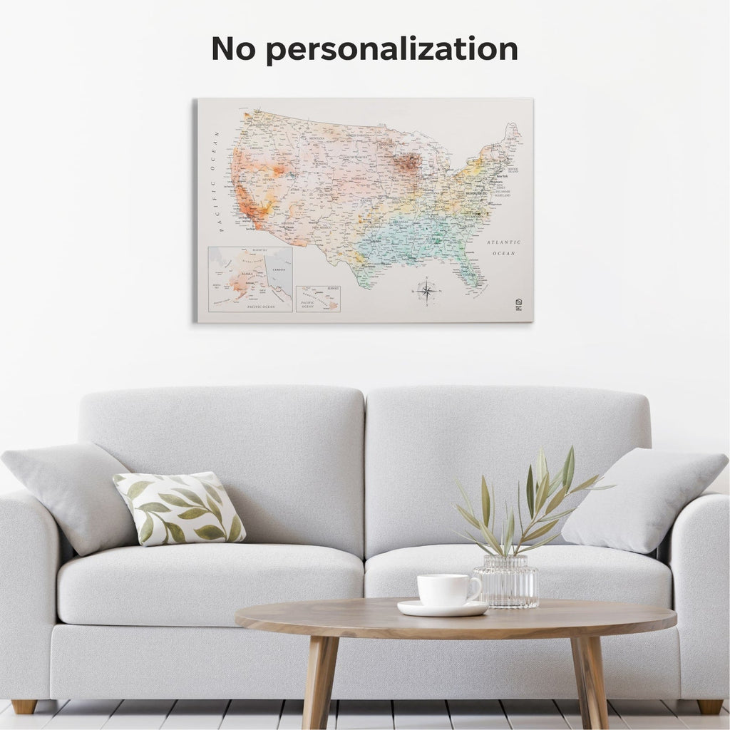 Map of the United States on a wall above a gray sofa with a wooden coffee table.
