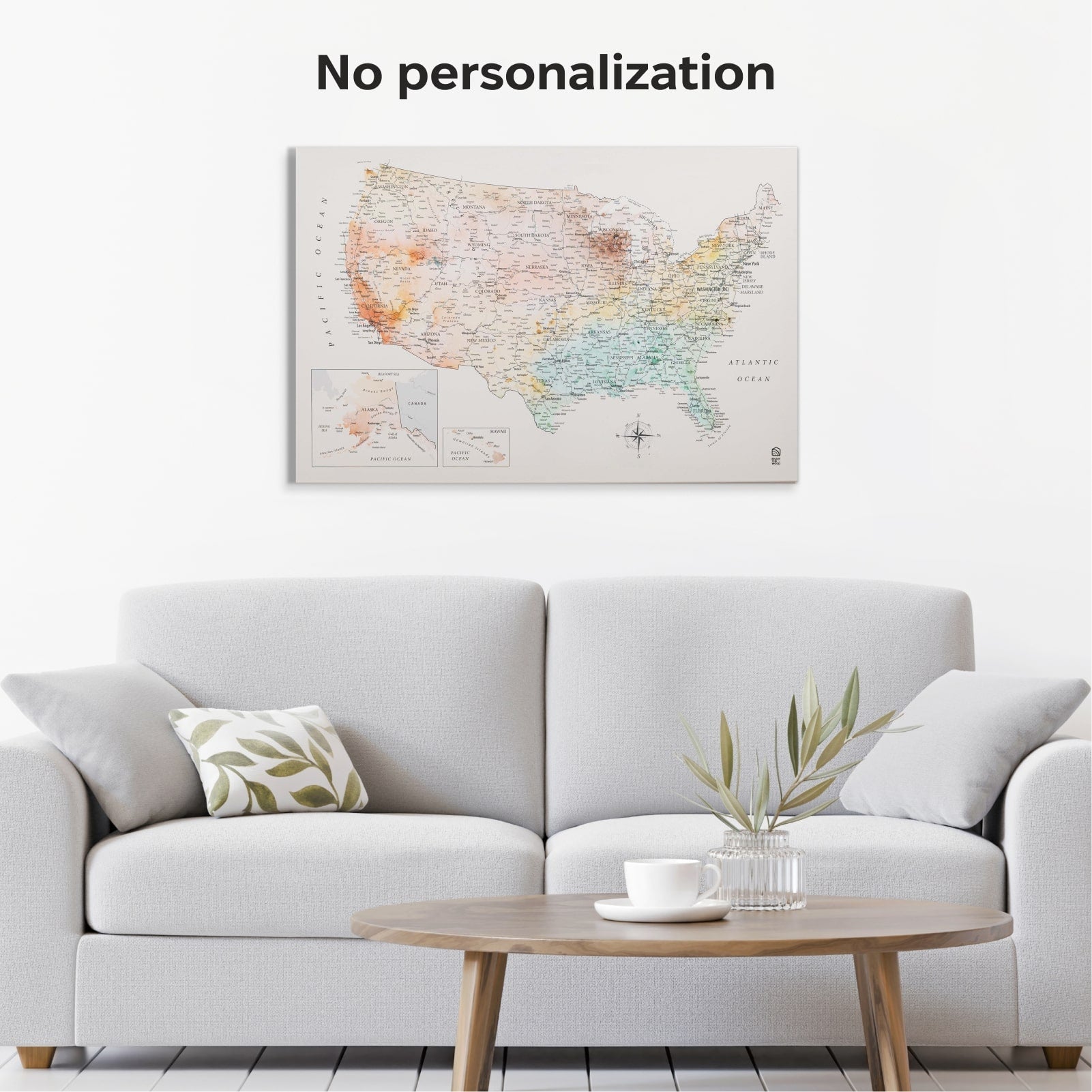 Map of the United States on a wall above a gray sofa with a wooden coffee table.
