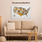 Beige sofa in a living room with a map of the United States on the wall.