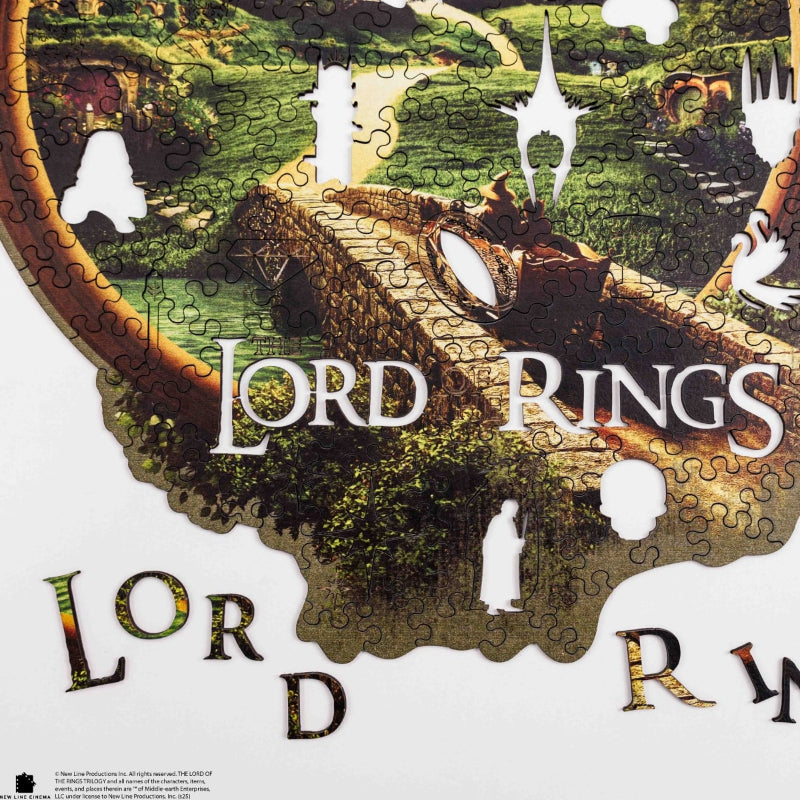 Jigsaw puzzle with 'Lord of the Rings' branding and character design.
