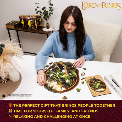 Woman assembling a puzzle of a natural scene with 'The Lord of the Rings' branding.