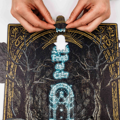 Hands interacting with a tarot card featuring mystical designs and text.