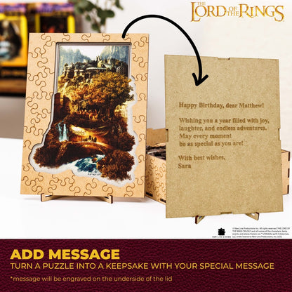 Jigsaw puzzle with a scenic image and a message card, inspired by 'The Lord of the Rings'.