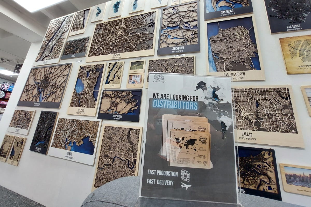 Wall display of various maps and a poster advertising for distributors.