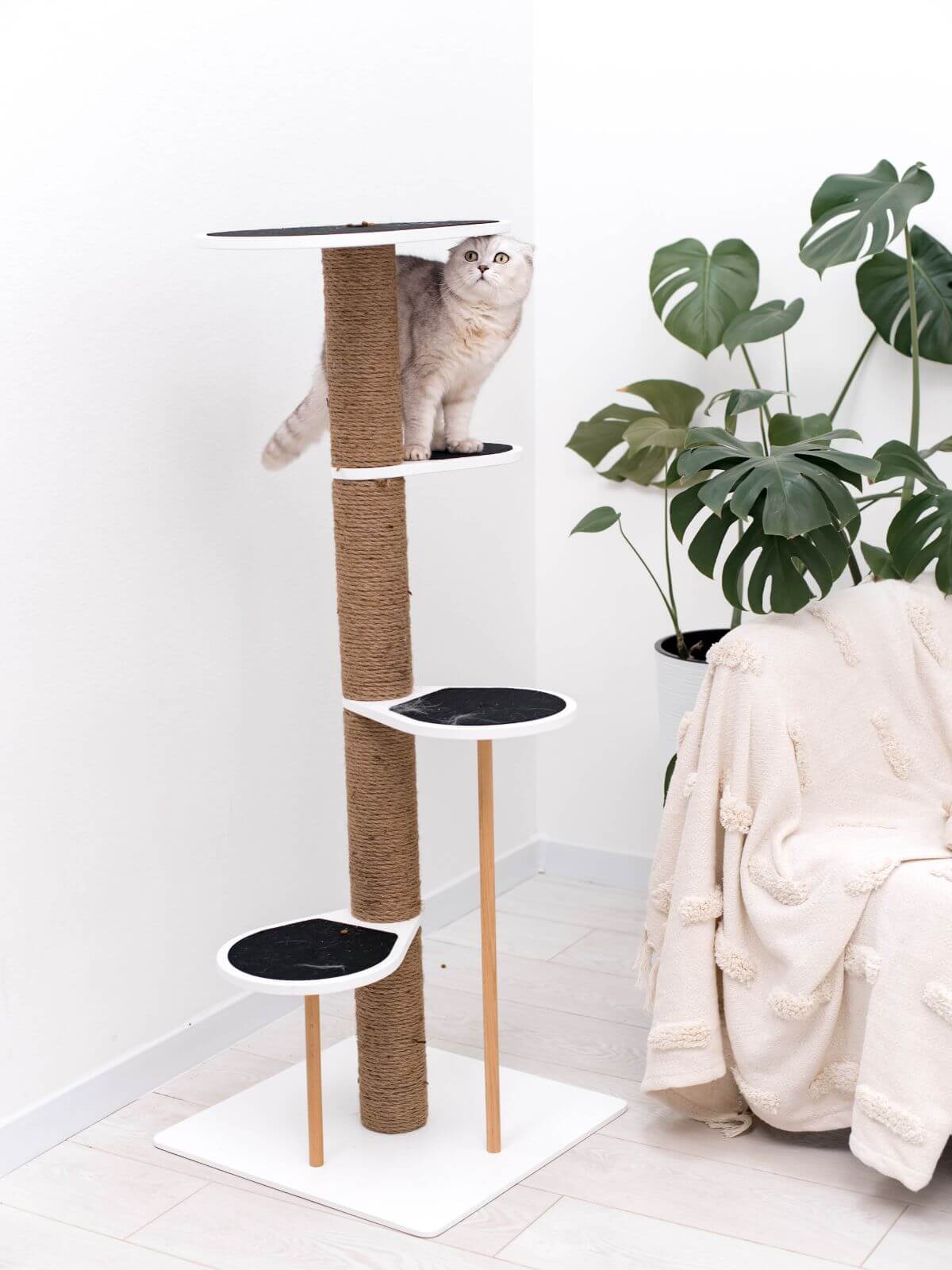 high climbing cat tower made with felt on steps