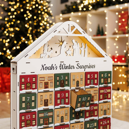 Advent calendar with 'Noah's Winter Surprises' in front of a Christmas tree.