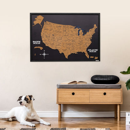 Map of the United States on the wall above a wooden bench with a dog sitting below.