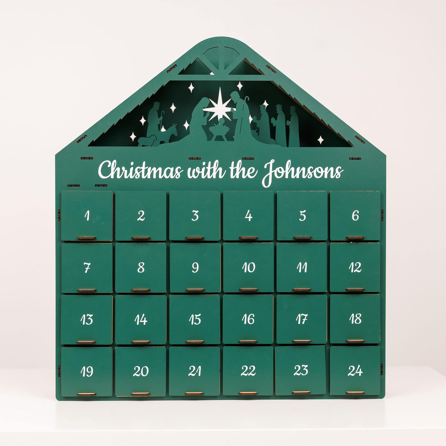 Green advent calendar with 'Christmas with the Johnsons' text on a white background