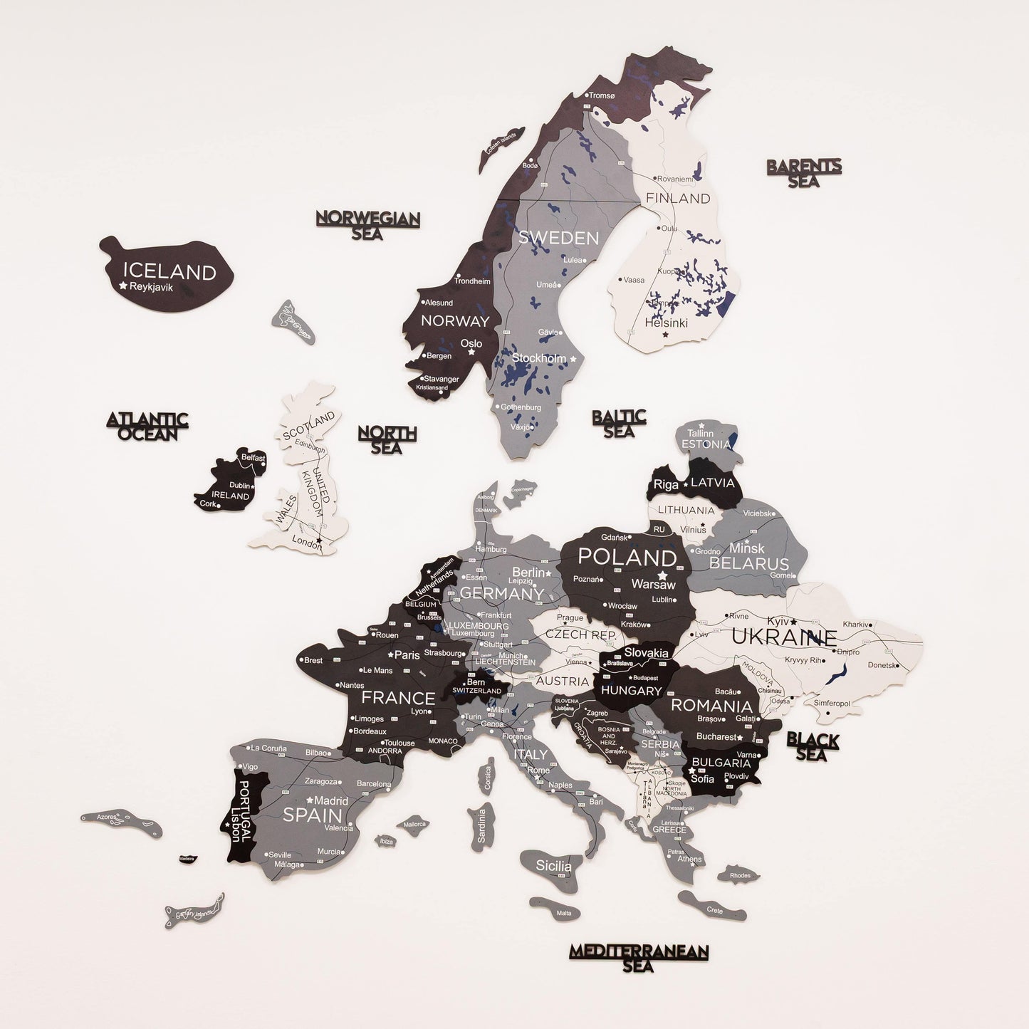 Map of Europe with country names and neighboring seas on a white background