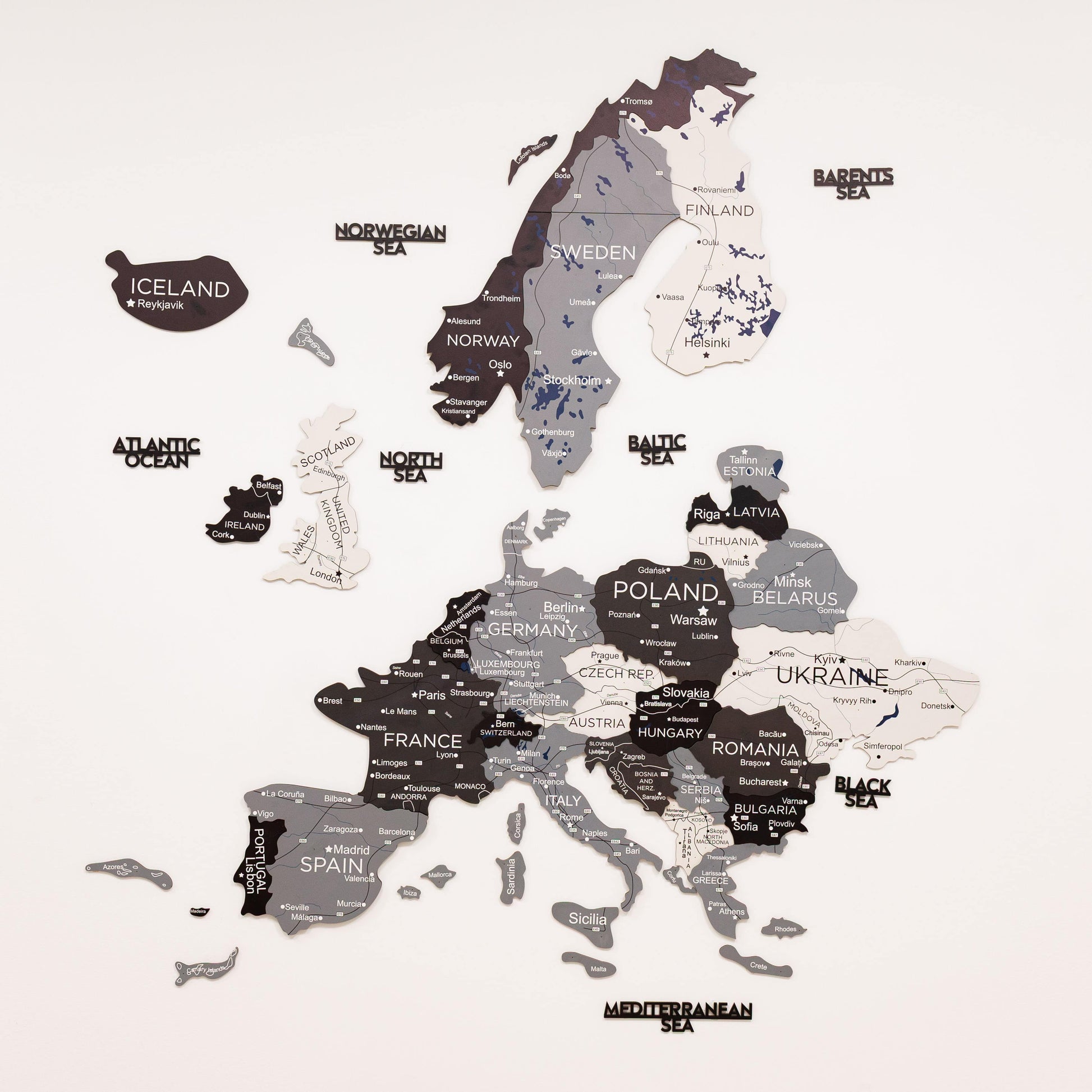 Map of Europe with country names and neighboring seas on a white background
