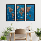 World map wall art in a modern office setting with plants and a desk.