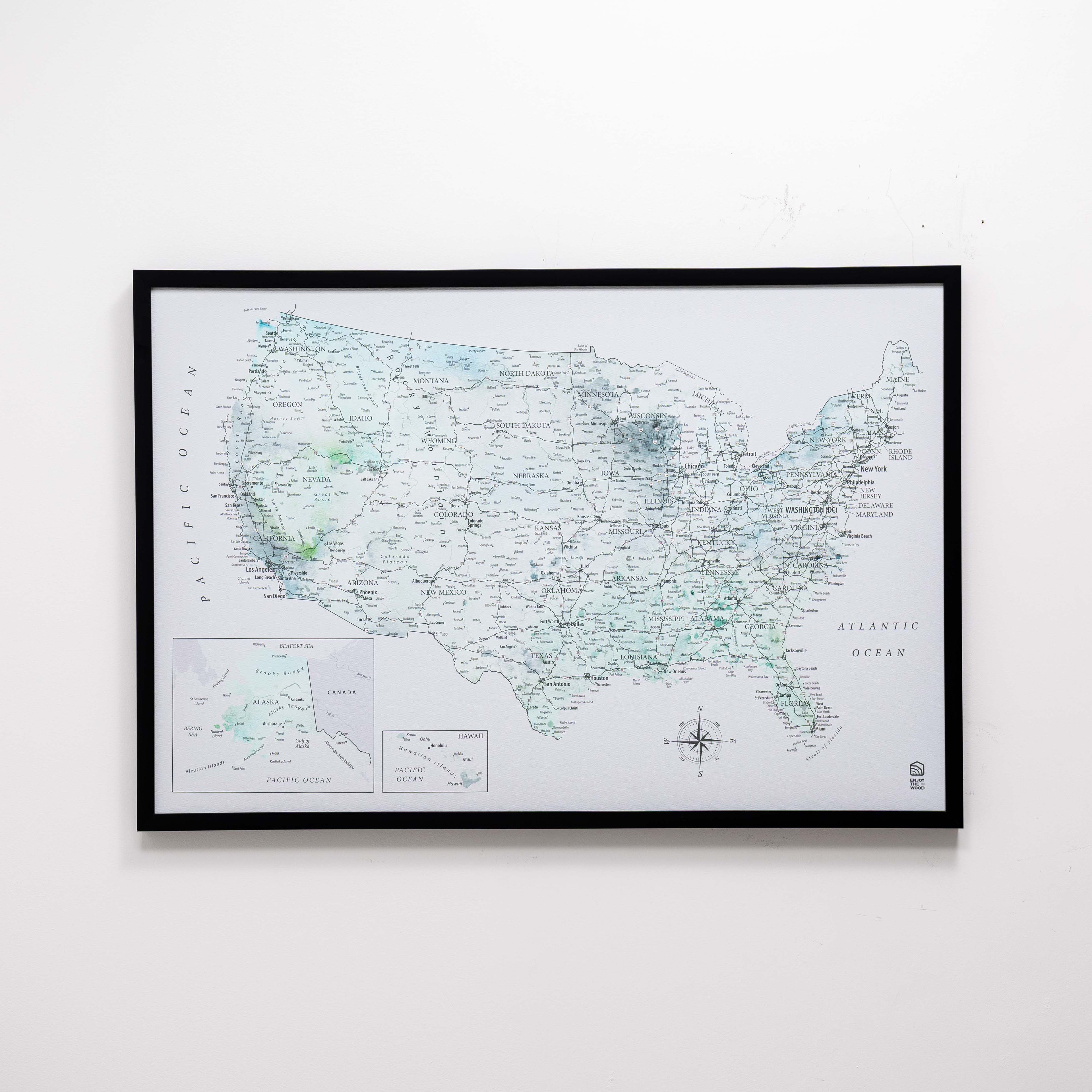 Framed map of the United States on a white wall