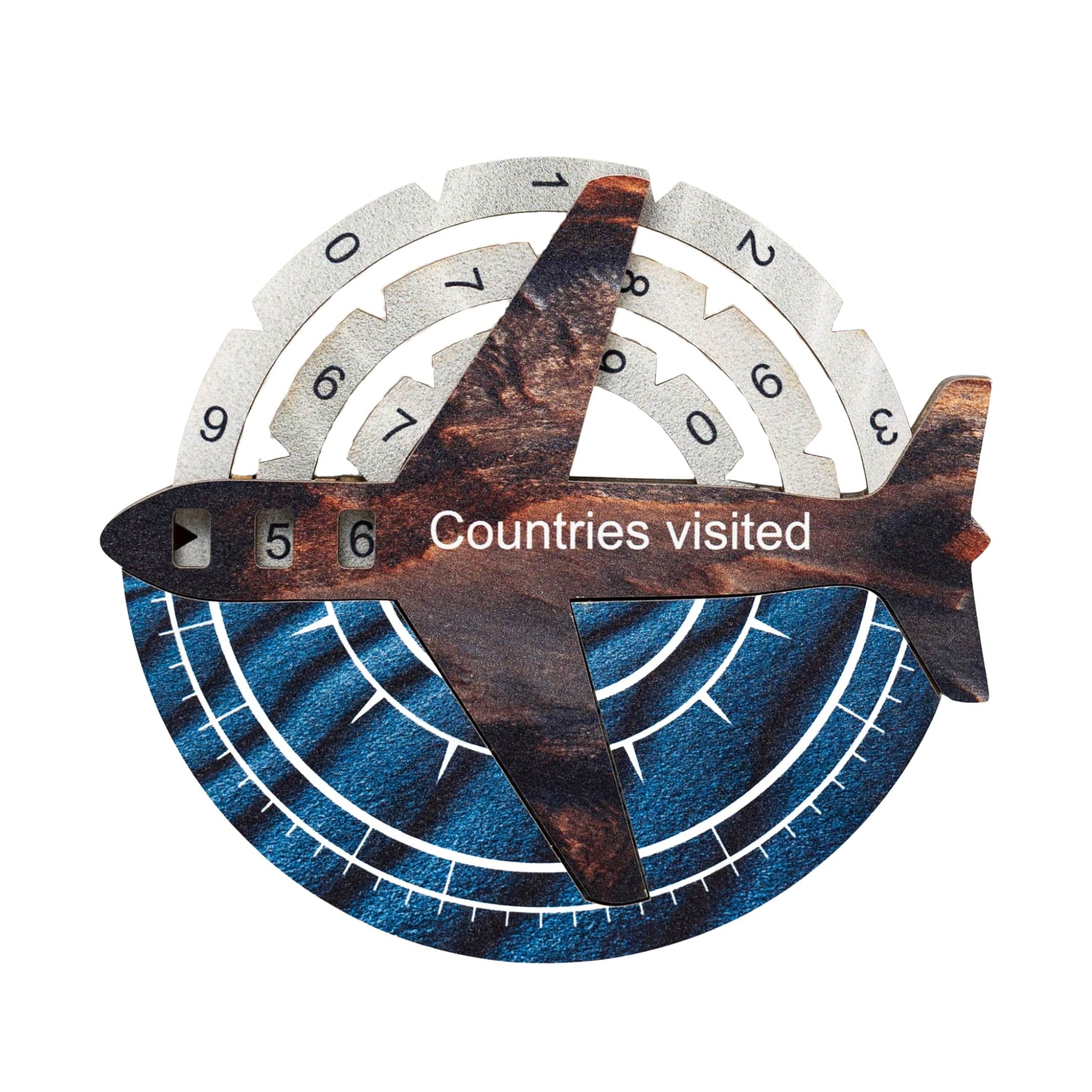 Decorative item with airplane design and 'Countries visited' text on a white background