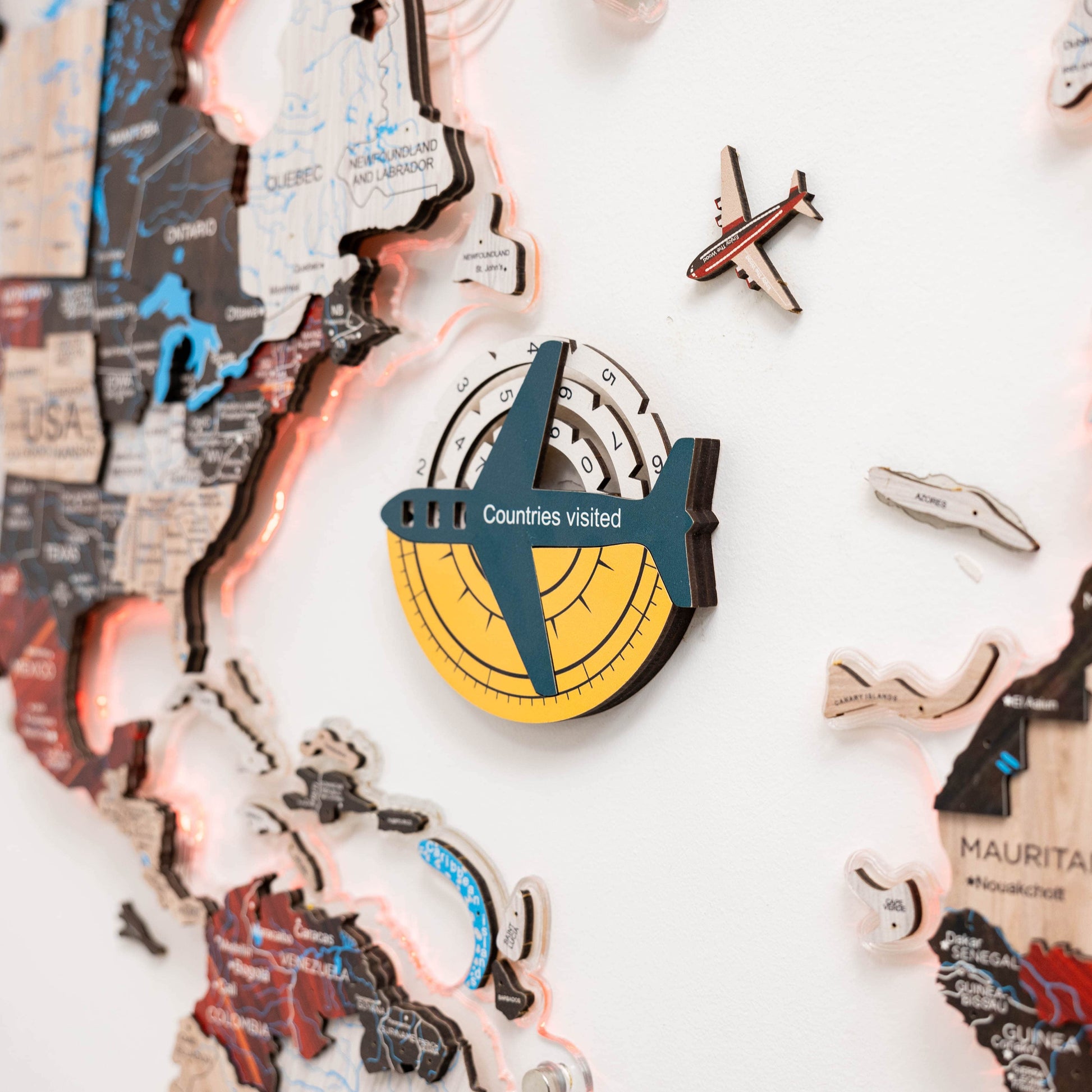 Decorative world map with airplane and 'Countries visited' counter on a white background