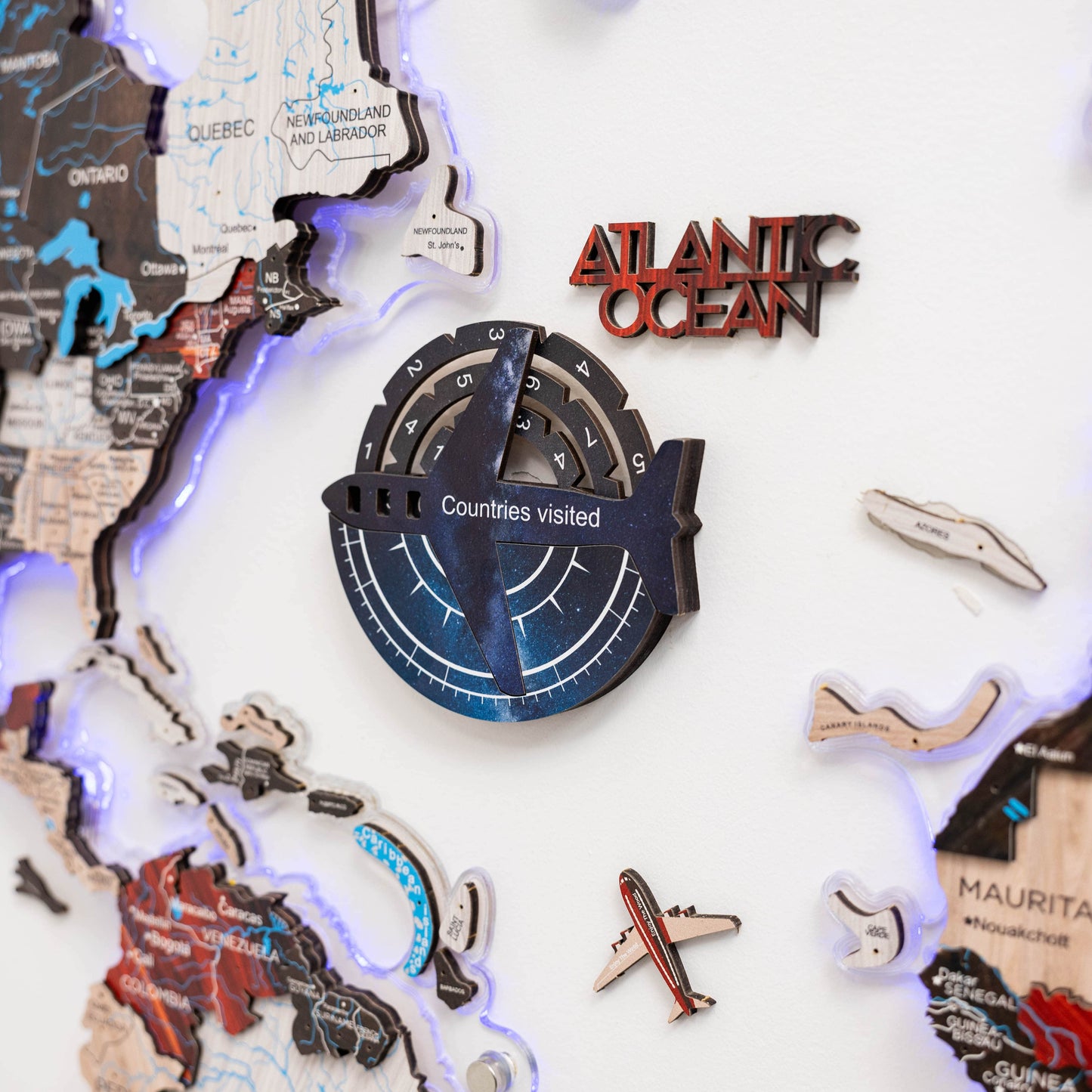 Map-themed travel tracker with 'Atlantic Ocean' and 'Countries visited' text on a world map background.