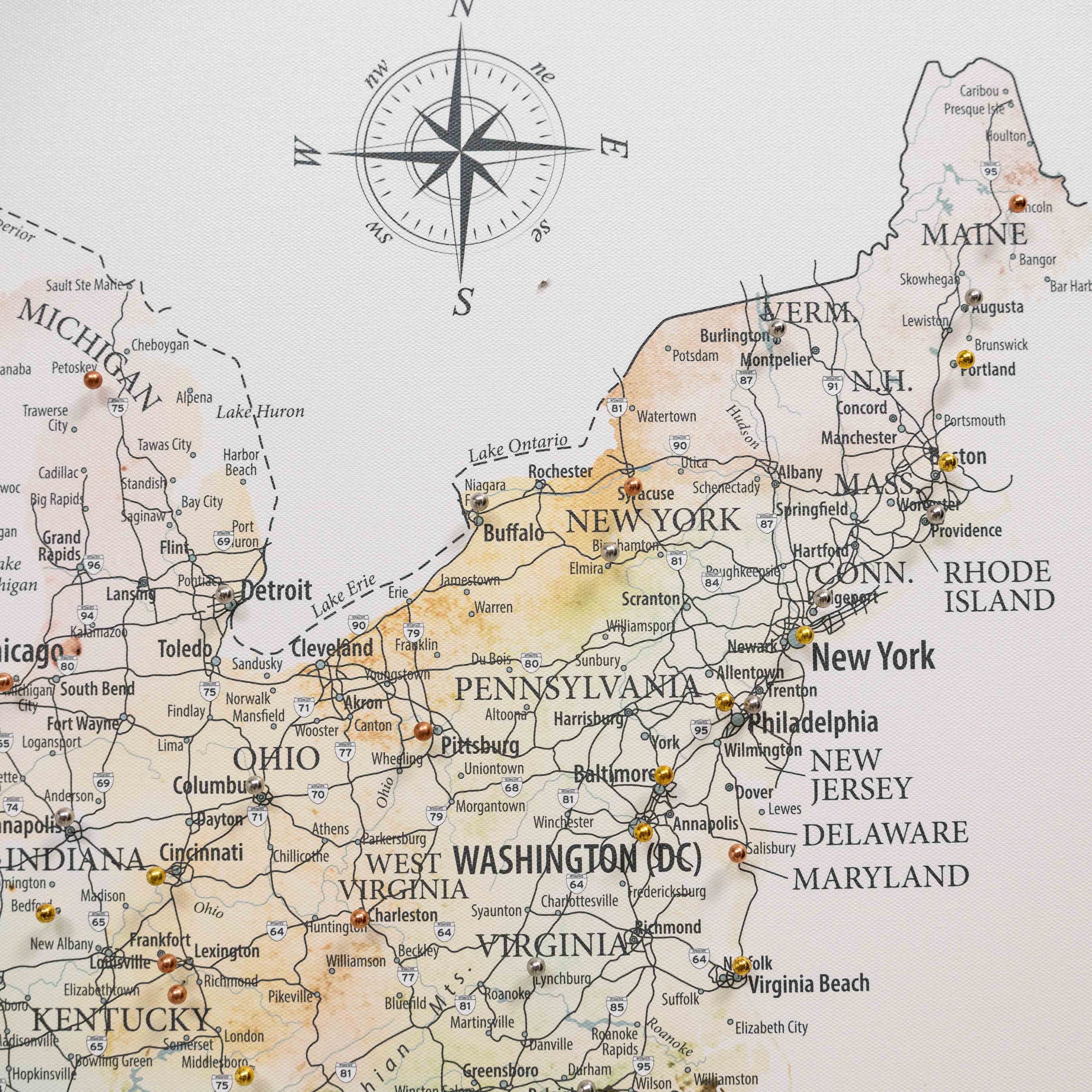 Map of the northeastern United States with a compass rose, showing states like New York, Pennsylvania, and Virginia.