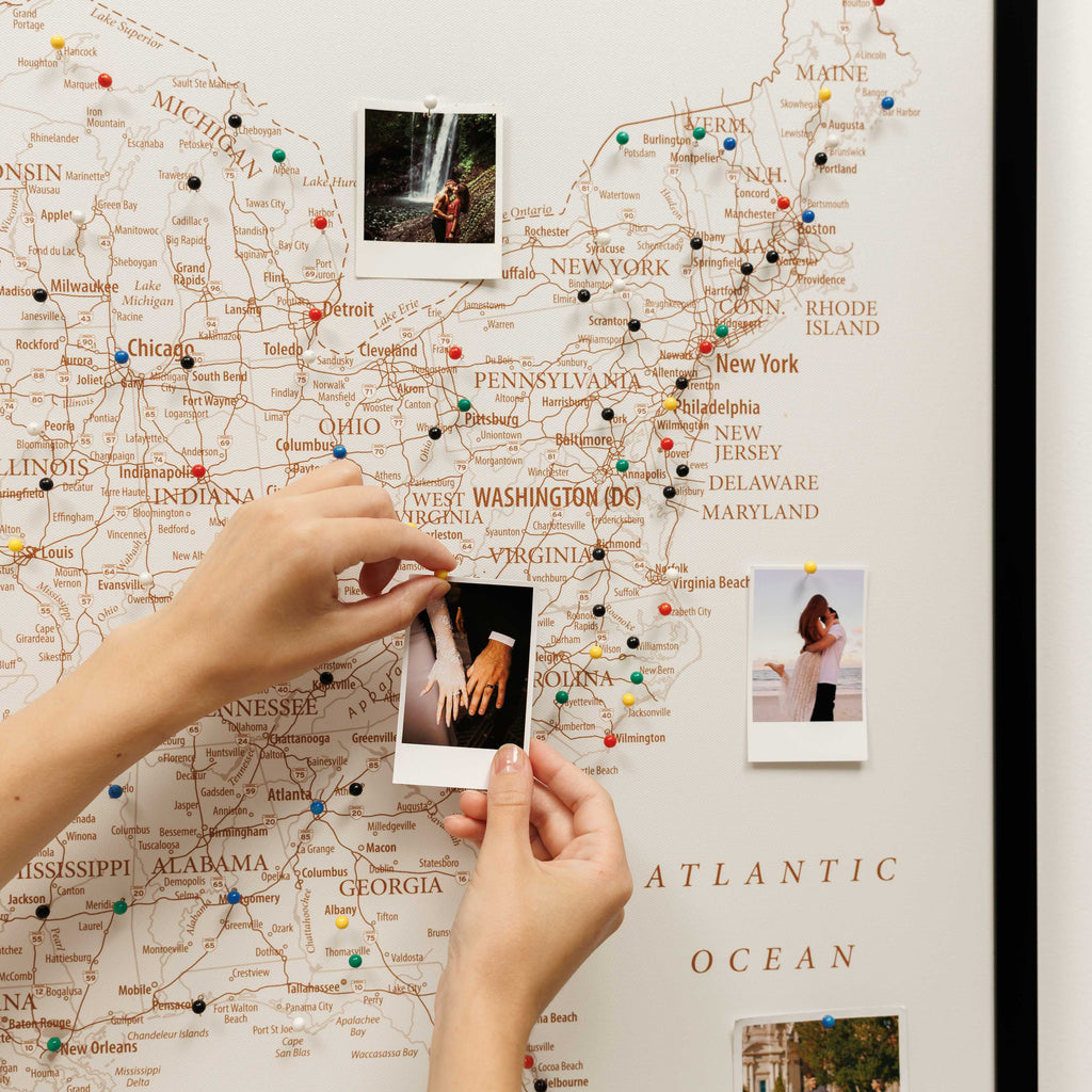 Map of the United States with photos pinned to it