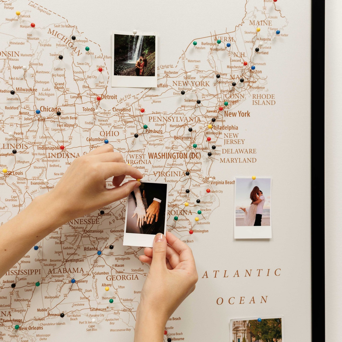 Map of the United States with photos pinned to it