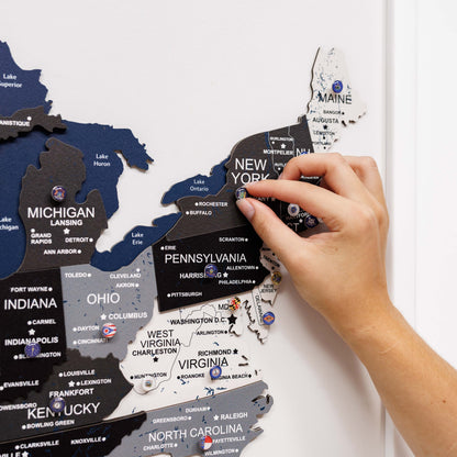 Hand interacting with a map of the United States on a white background