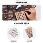 Display of push pins and sticky pins with a hand interacting with them, set against a white background.