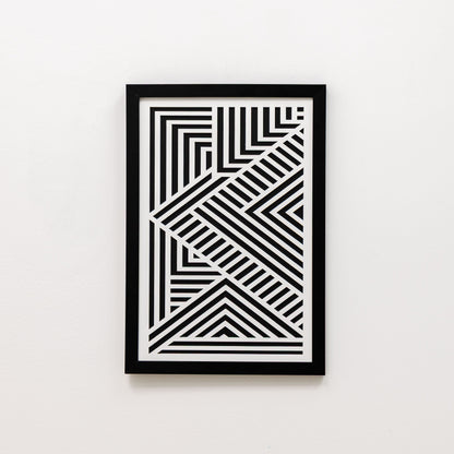 Framed black and white geometric art on a white background