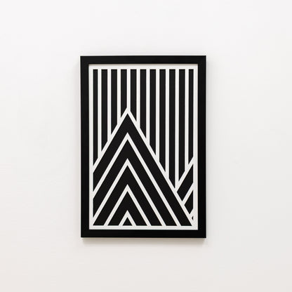 Framed black and white geometric art print on a light gray background