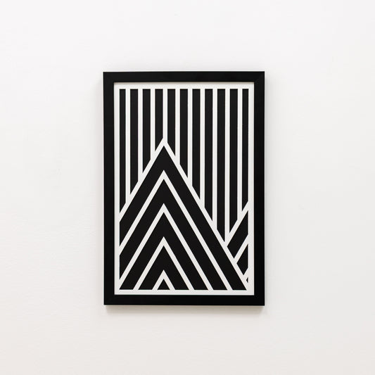 Framed black and white geometric art print on a light gray background