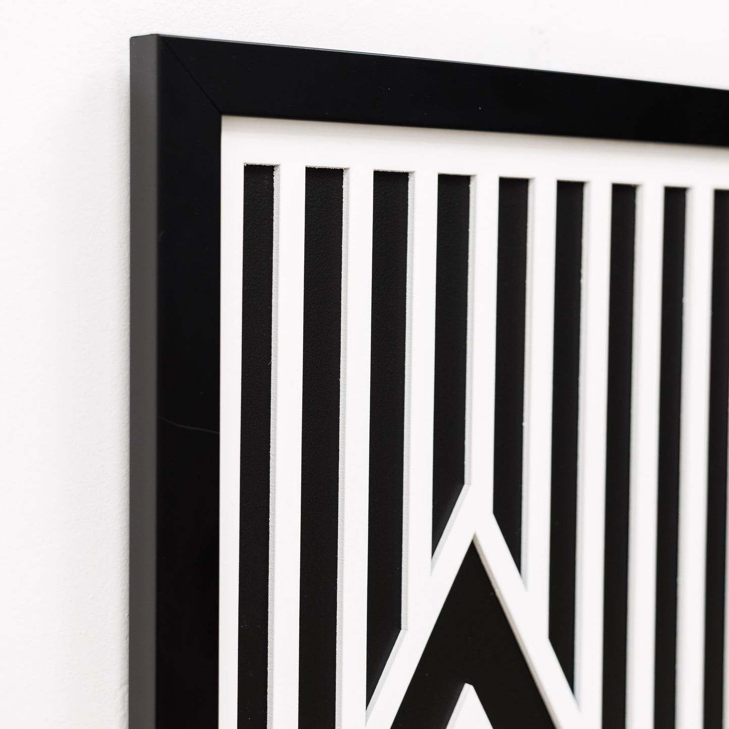 Black and white geometric design on a white background