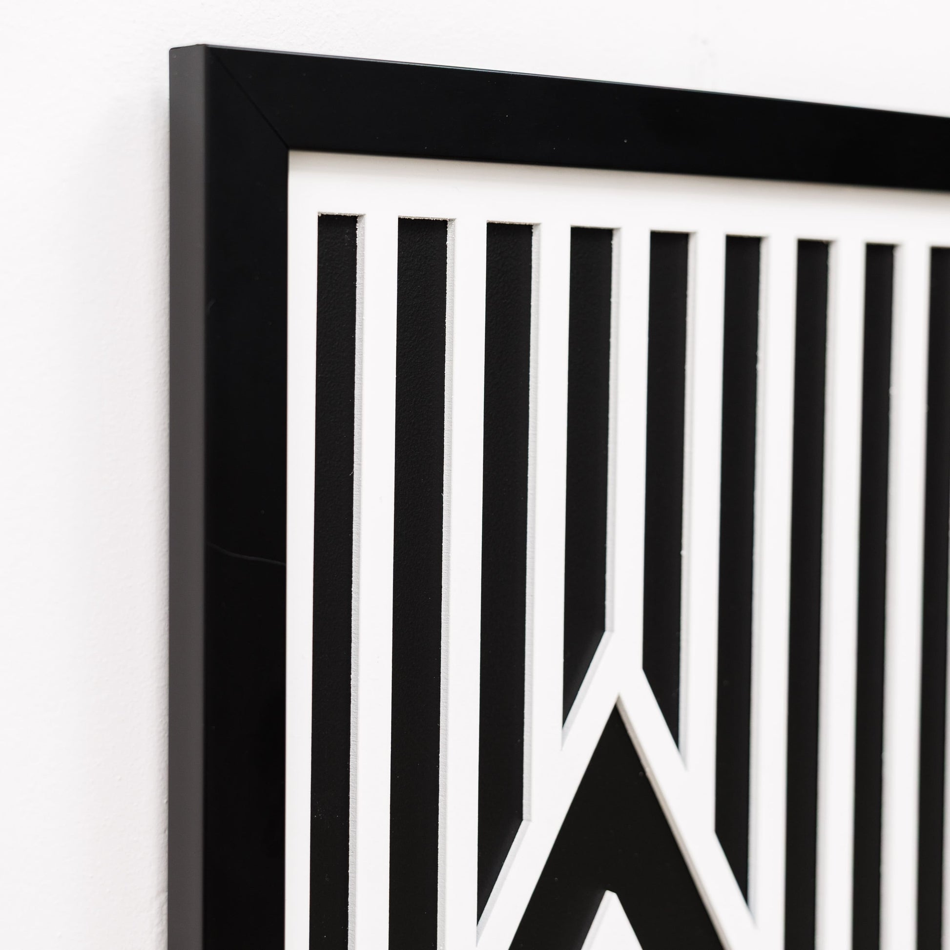 Black and white geometric design on a white background