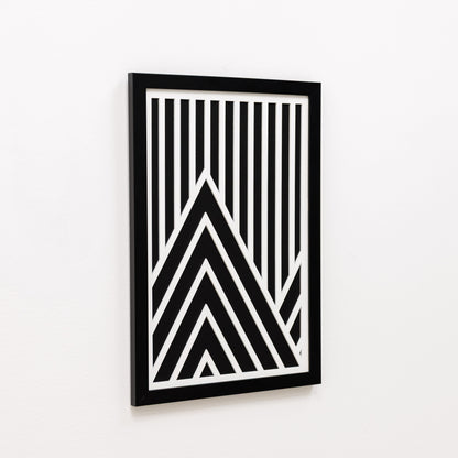 Framed black and white geometric art on a white background