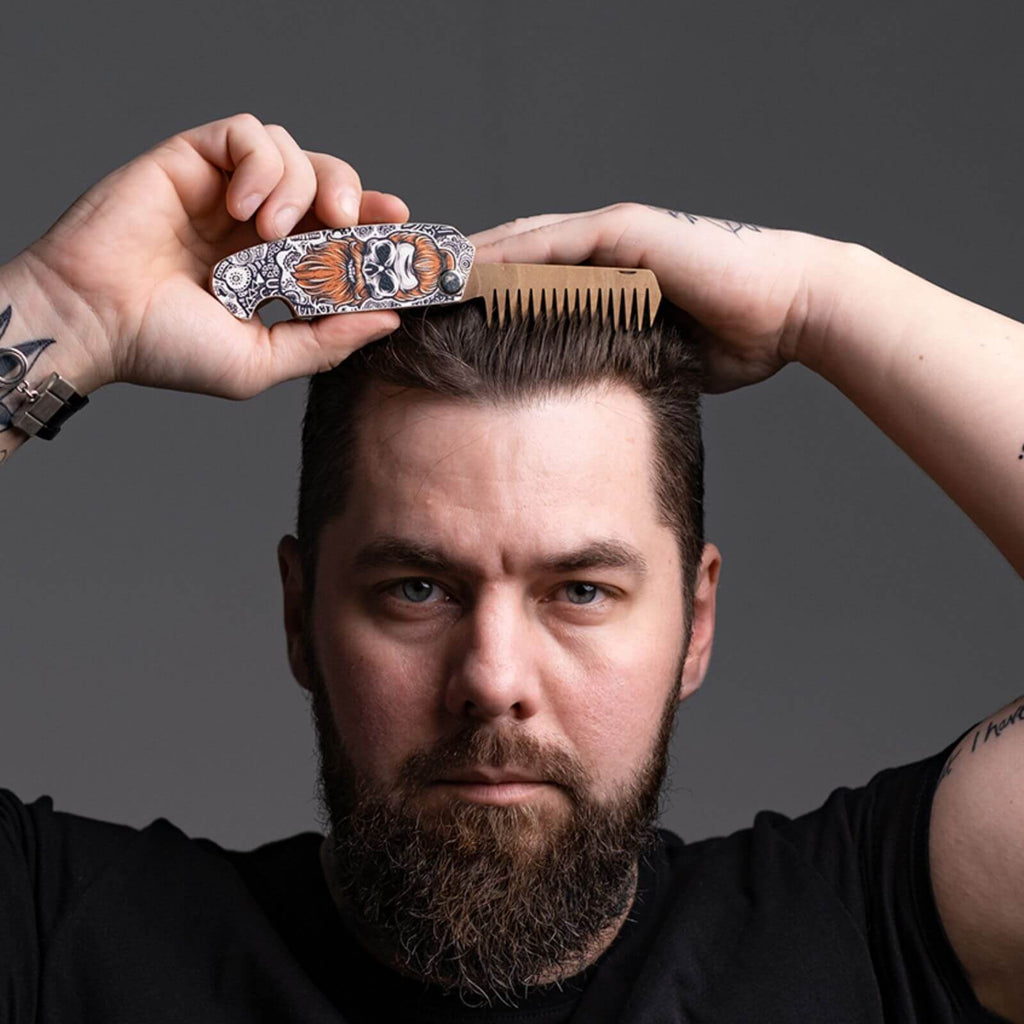 man combs on wood 